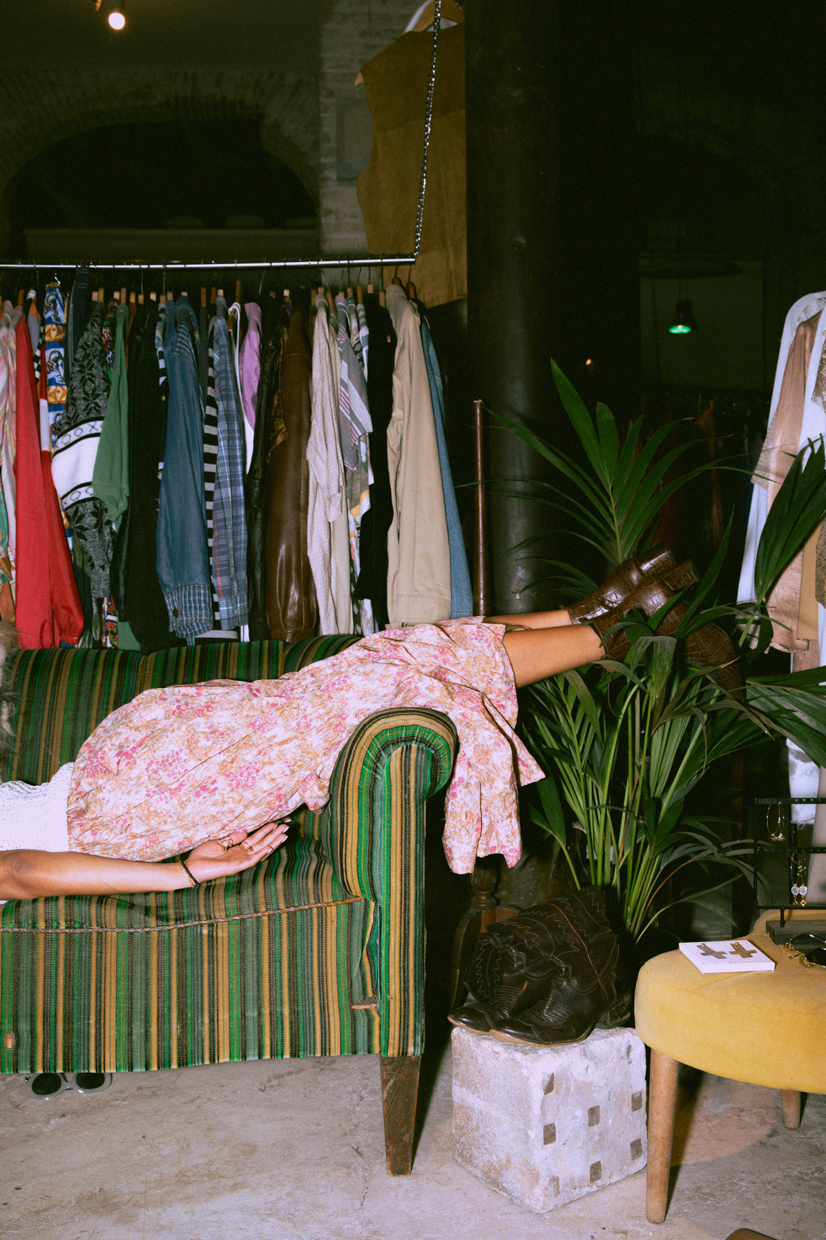 Woman Lying on the Sofa in a Vintage Store